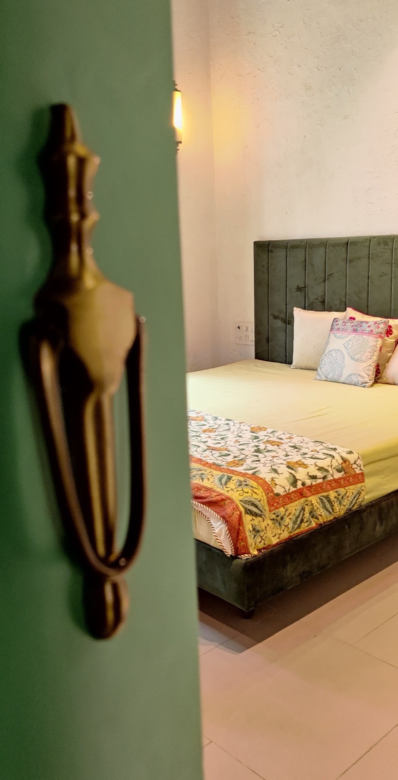 Bedroom with the signature green door
