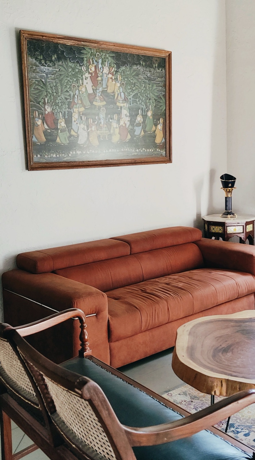 Living room with traditional artwork